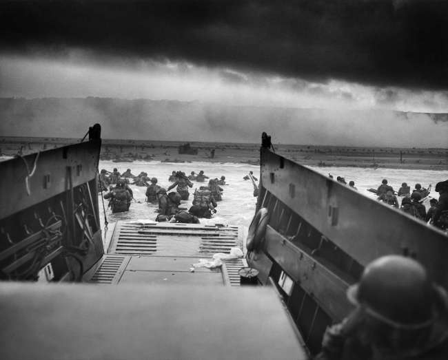 U.S. Troops wading through water and Nazi gunfire